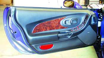 1997-2004 Corvette THE ELEGANT LOOK OF THESE ROSEWOOD DOOR PANELS CAN INSTANTLIY TRANSFORM YOUR CORVETTE INTERIOR. THE