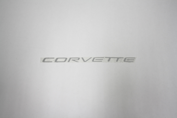 1997-2004 Corvette C5 AIRBAG CORVETTE LETTERS SILVER. MEASURES 7 1/2" X 1/2"