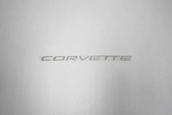1997-2004 Corvette C5 AIRBAG CORVETTE LETTERS SILVER. MEASURES 7 1/2" X 1/2"